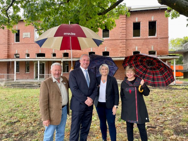 New training program offers aged care workforce boost for Tasmania University of Tasmania Rural Health Director Tony Barnett, Minister for Senior Australians and Aged Care Services, Richard Colbeck, Liberal candidate for Lyons Susie Bower and  Corumbene Care CEO Alison Standen take a first look at the future site of the new teaching hub at Corumbene Care, New Norfolk - as part of the former asylum site redevelopment.  